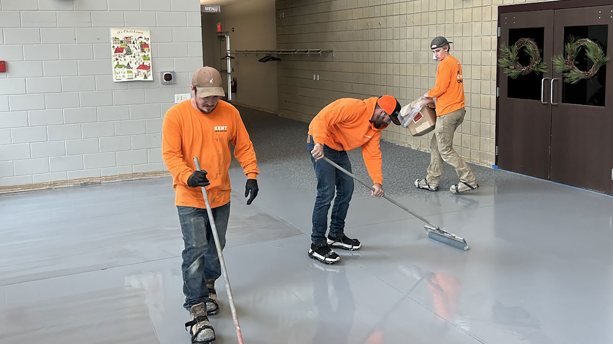 KHS team doing commercial concrete floor coating
