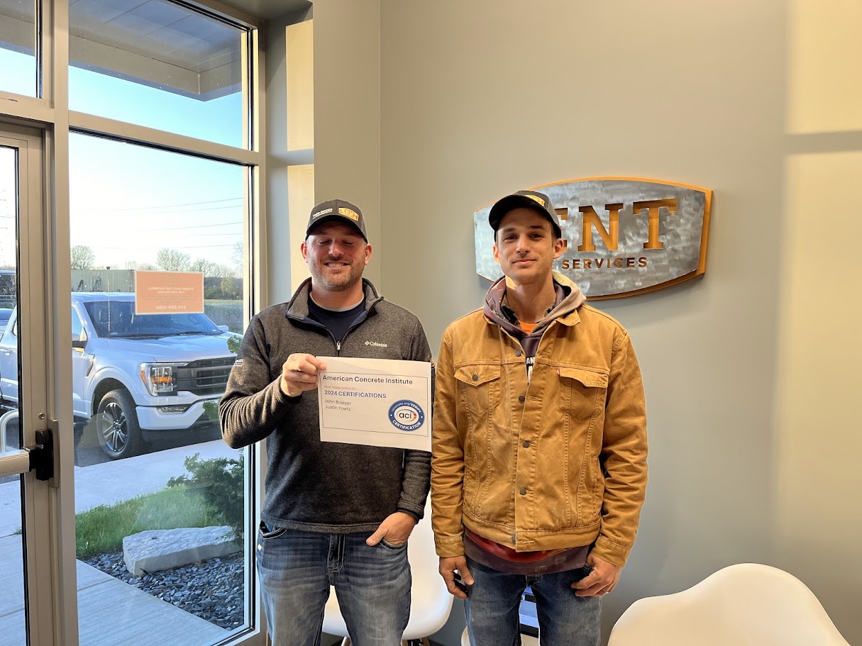 Kent Home Services installers holding ACI certification recognition inside the office