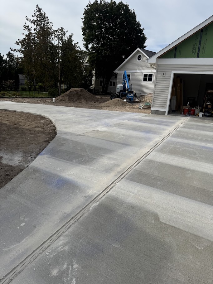 Completed concrete driveway with control joints to prevent cracking